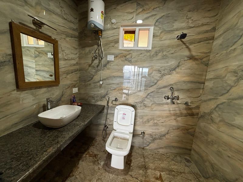 Marble bathroom with vessel basin